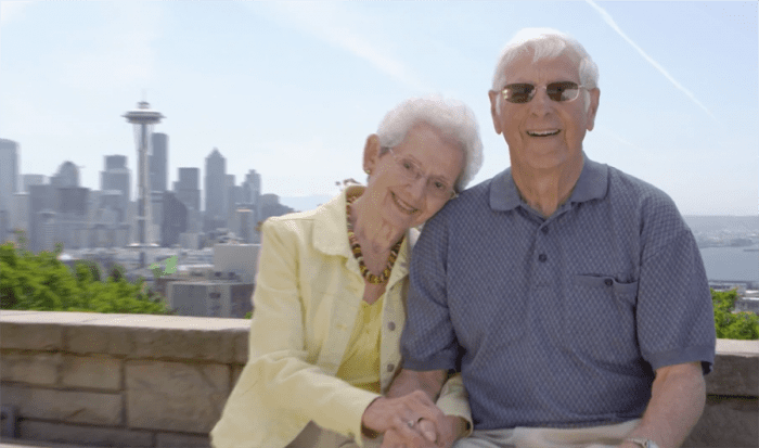 An elderly couple smiles in Seattle