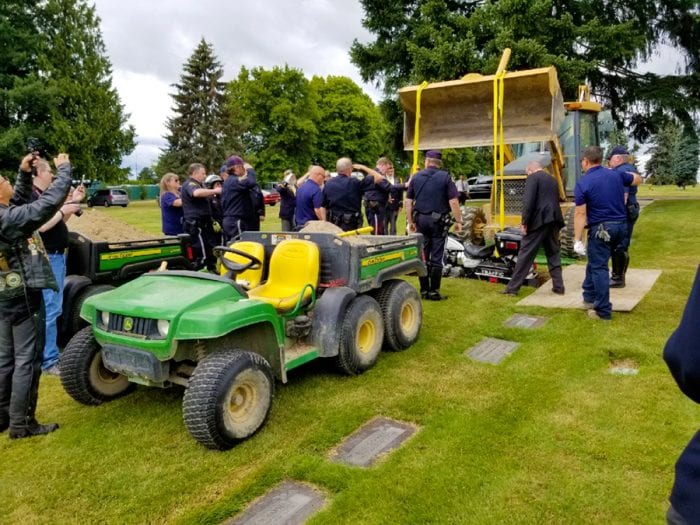 A man is buried in his motorcycle at Washington Memorial cemetery