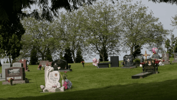 A cemetery with flowers